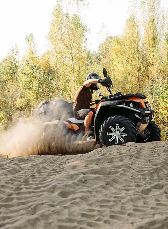 ATV riding in sand