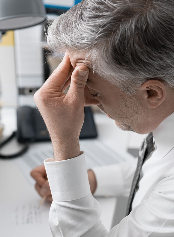 Businessman looking over paperwork