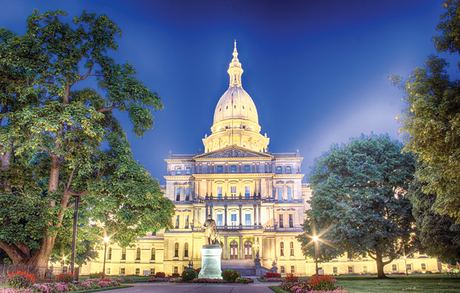 Nighttime photo of the Michigan State Capitol Building.