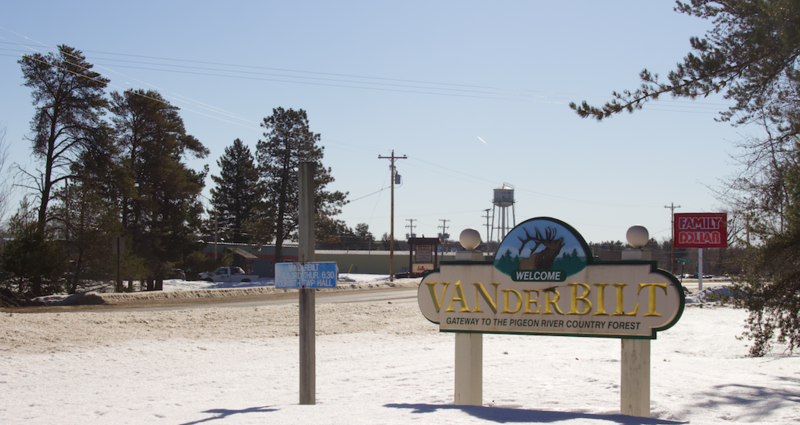 Welcome to Vanderbilt sign at the entrance to the small Michigan town.