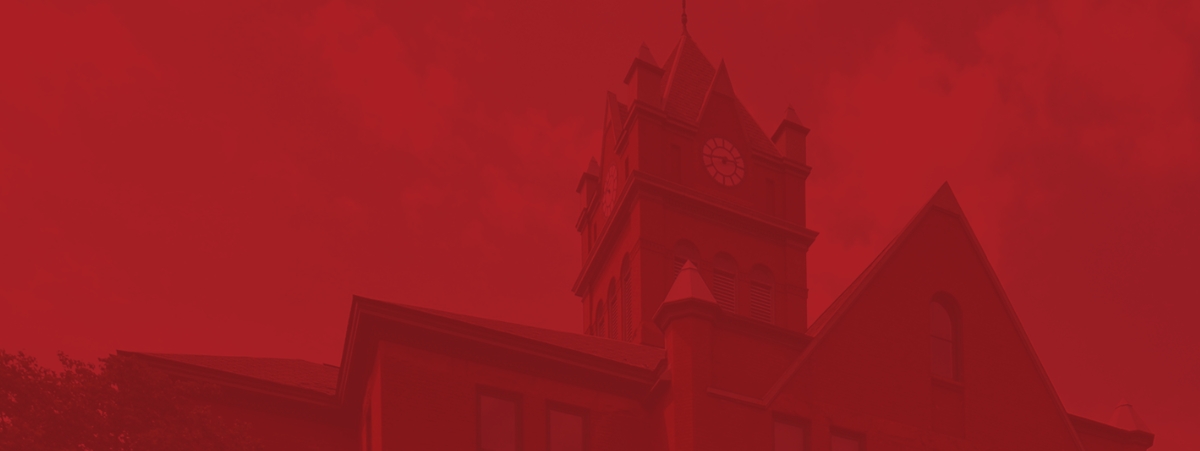 A picture of a courthouse clock tower.